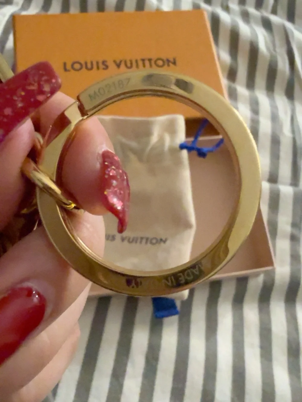 Louis Vuitton Gold Textured Leather Logo & Charm/Key Holder